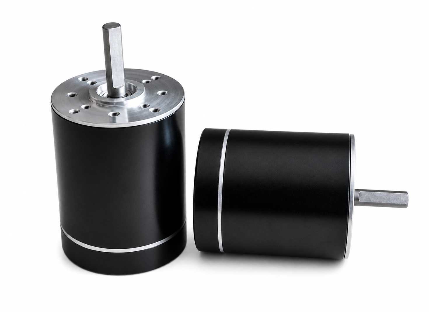 Two views of a 50 millimetre cylindrical brushless motor with integral electronic drive